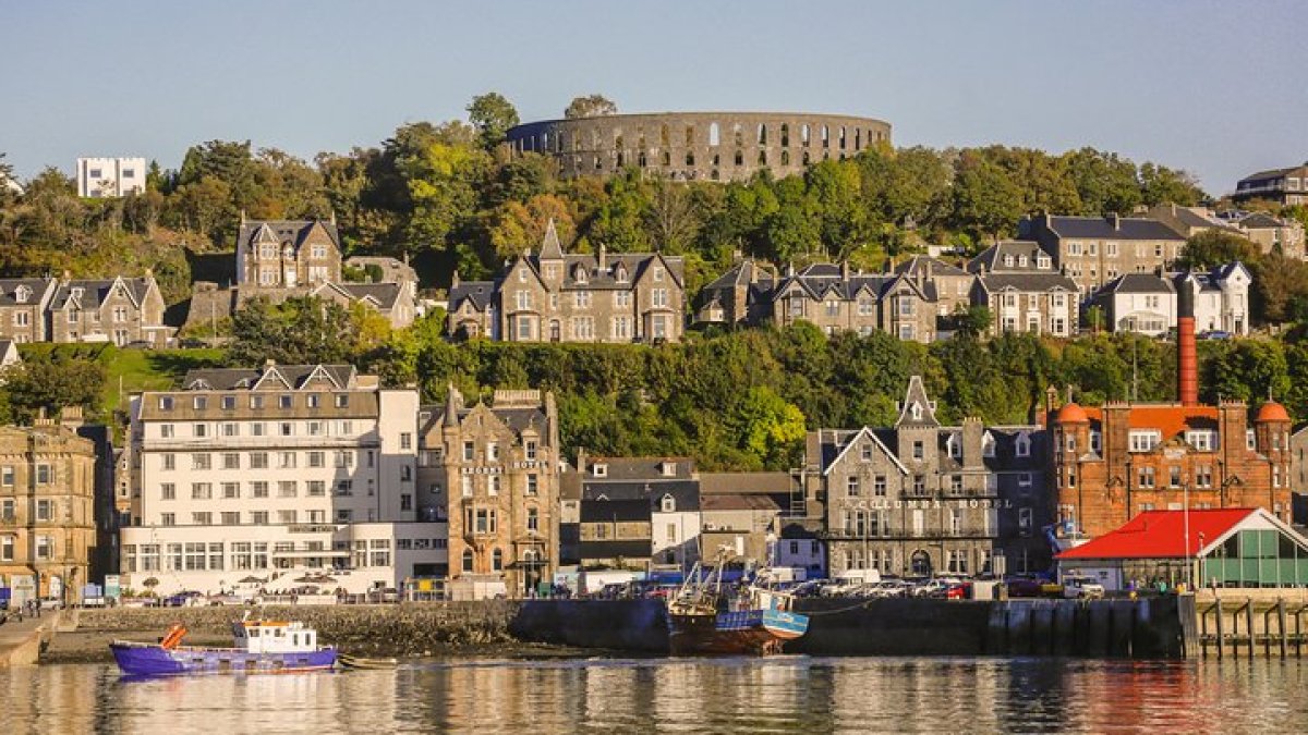 a castle surrounded by a body of water