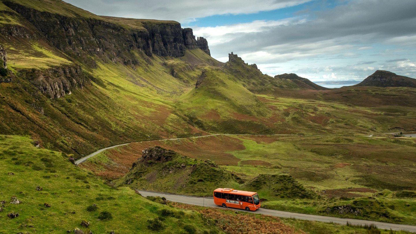 The Hairy Coo coach on a tour on the Isle of Skye