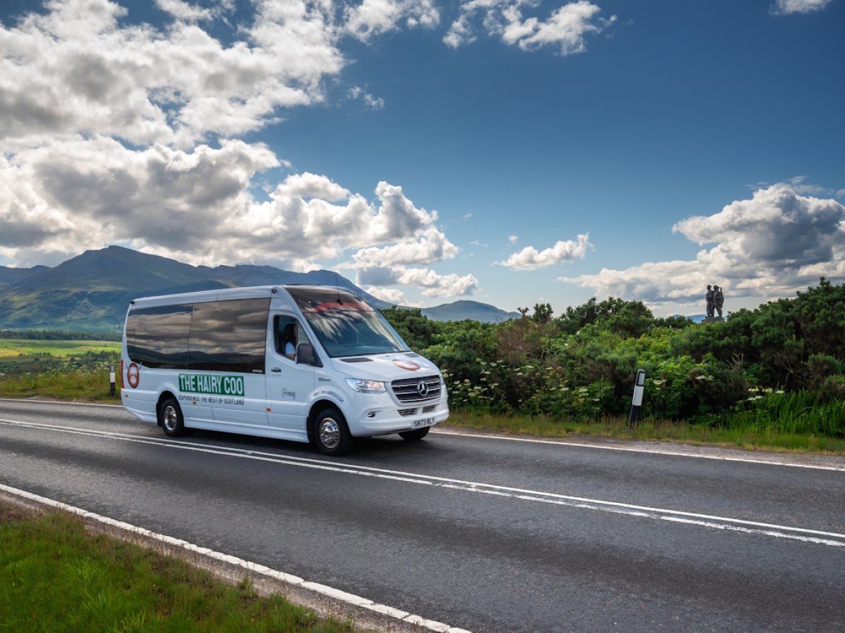 The Hairy Coo mini-coach by the Commando Monument